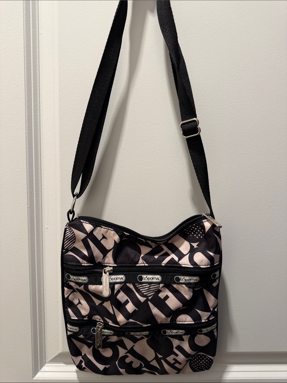 LeSportsac Black and Blush Letterprint Nylon Crossbody Bag